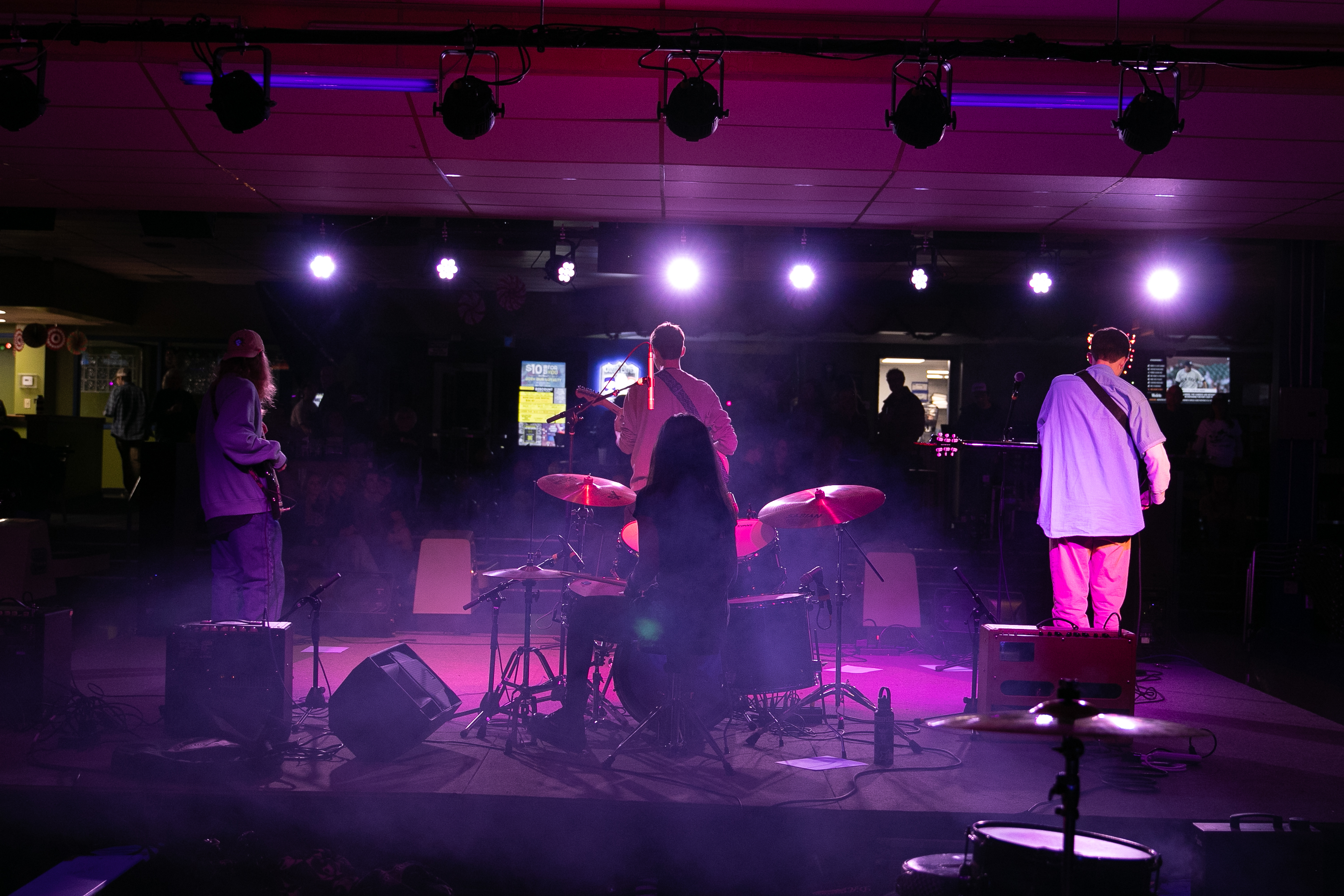 Band posing with fans